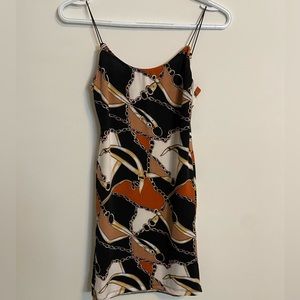 Brown, white, black patterned dress